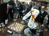 Robot playing chess